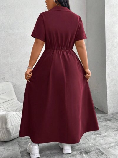 robe ample de couleur unie avec fermeture éclair à l'avant, manches courtes