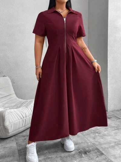 robe ample de couleur unie avec fermeture éclair à l'avant, manches courtes