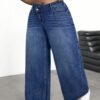 jeans longs amples à taille asymétrique