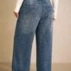 jeans grande taille asymétrique à taille haute