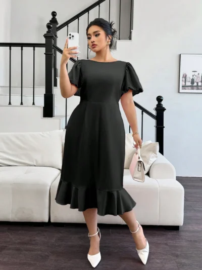 Robe élégante avec manches bouffantes et ourlet sirène