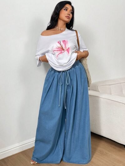 Jeans à taille haute, coupe ample et jambe évasée,