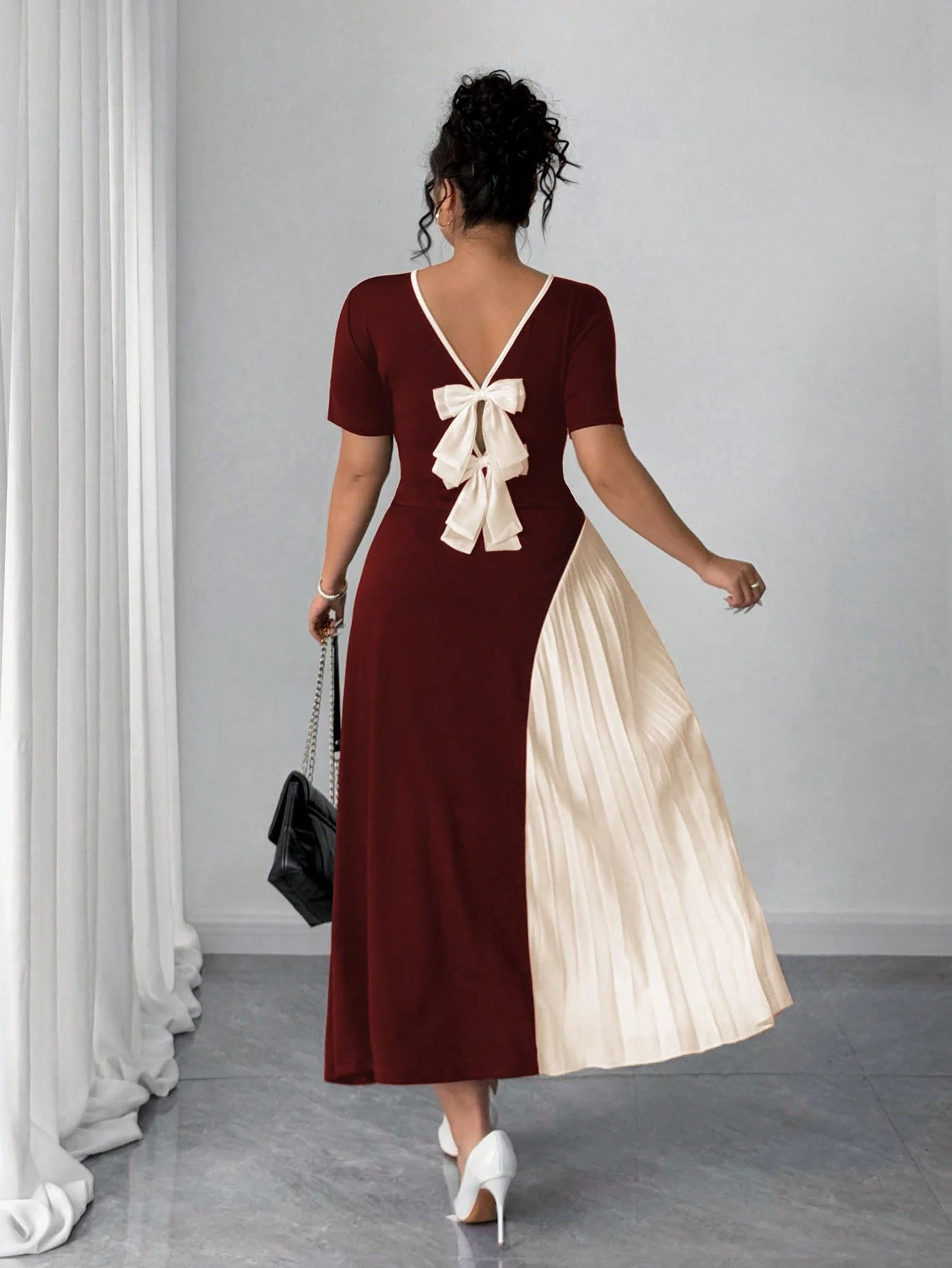 Robe à la mode de style français avec plissés, nœud papillon. – Image 2