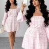 Robe élégante à col rond avec décoration de boutons et taille évasée – Image 3